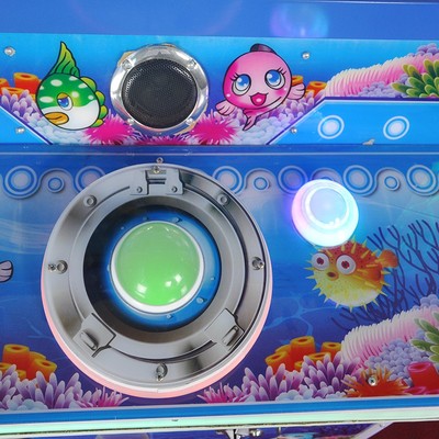 慧兒星動漫001大魚吃小魚機 經典電玩設備的沉浸式體驗與細節解析